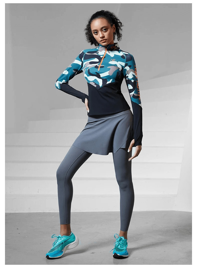 Woman wearing Women's Camo Print Long Sleeves Sport Shirt SF2019 with leggings; athletic camo rashguard for all seasons.
